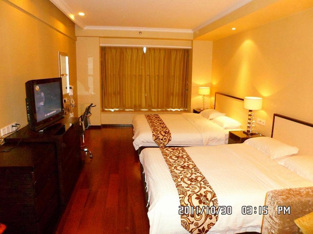 Guangzhou Meiyijia Hotel Apartment Номер фото