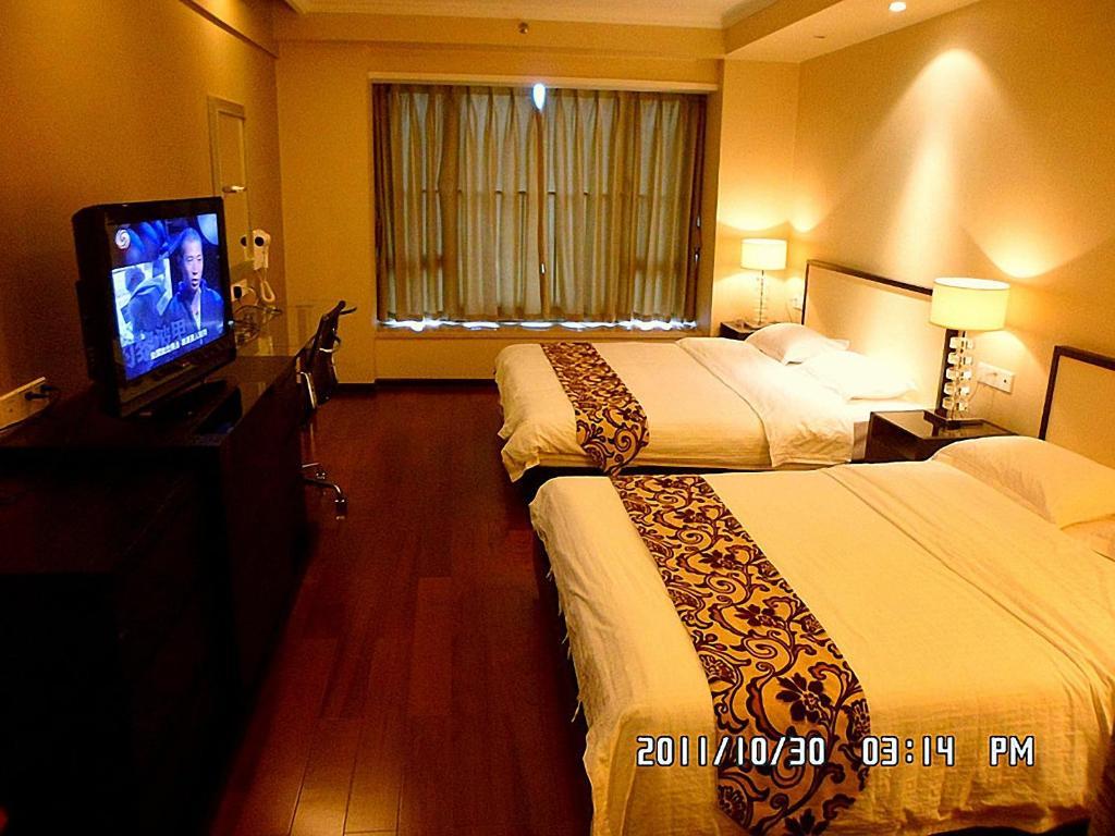 Guangzhou Meiyijia Hotel Apartment Номер фото