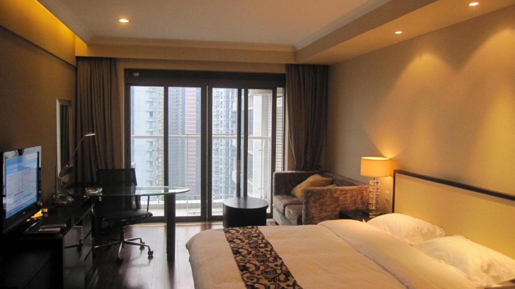 Guangzhou Meiyijia Hotel Apartment Номер фото