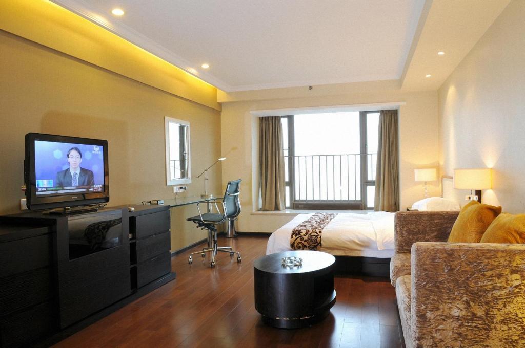 Guangzhou Meiyijia Hotel Apartment Номер фото