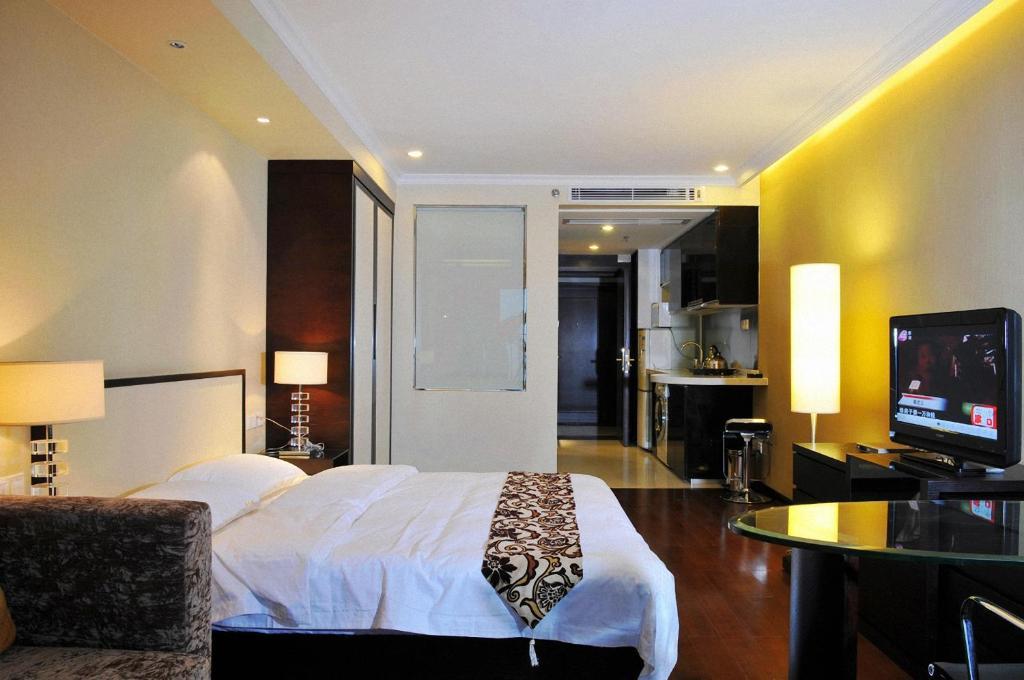 Guangzhou Meiyijia Hotel Apartment Номер фото
